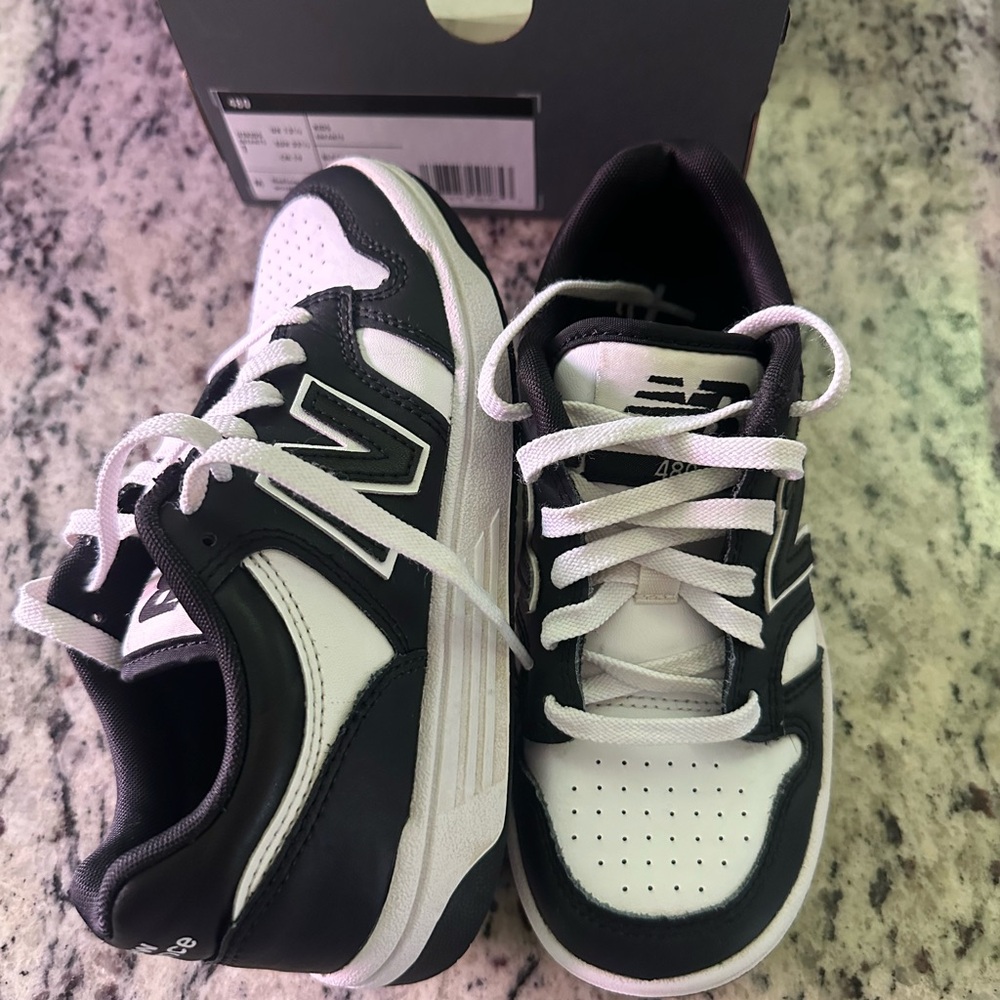 New Balance Black and White Athletic Shoes